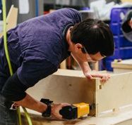 Craftsman building a sofa frame in our Austin workshop